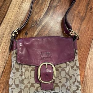 Beautiful Coach purse with adjustable strap. Purple leather with tan cloth.
